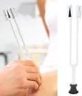 Weighted medical tuning forks used in vibration therapy