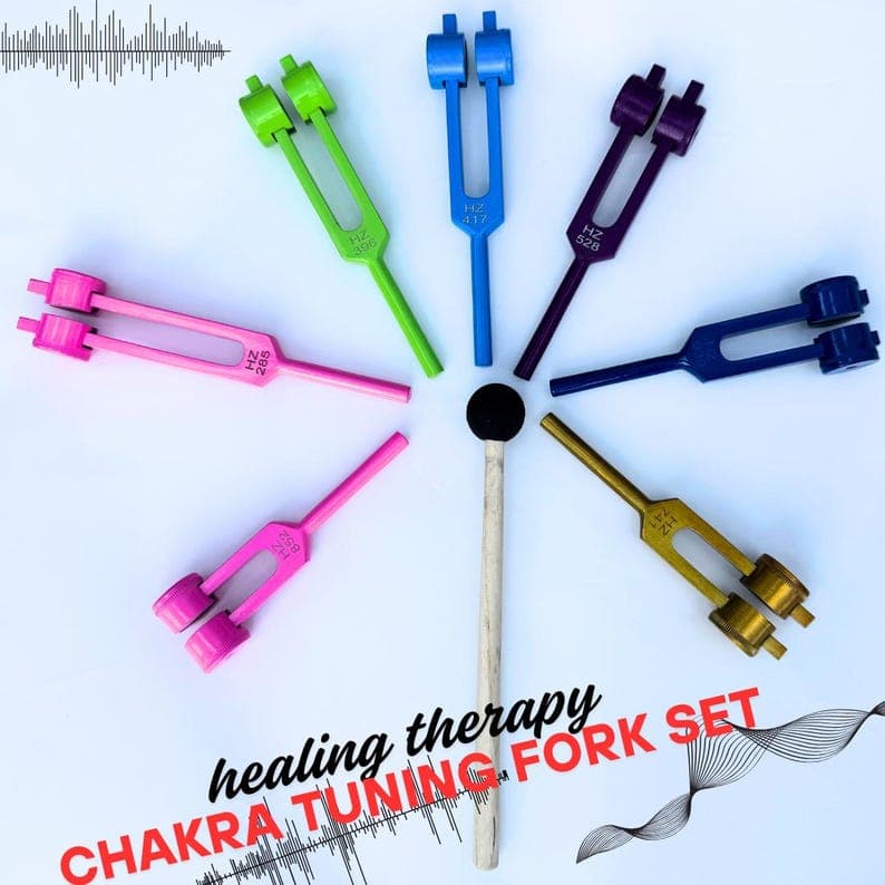 Weighted tuning forks for chakra balancing and yoga