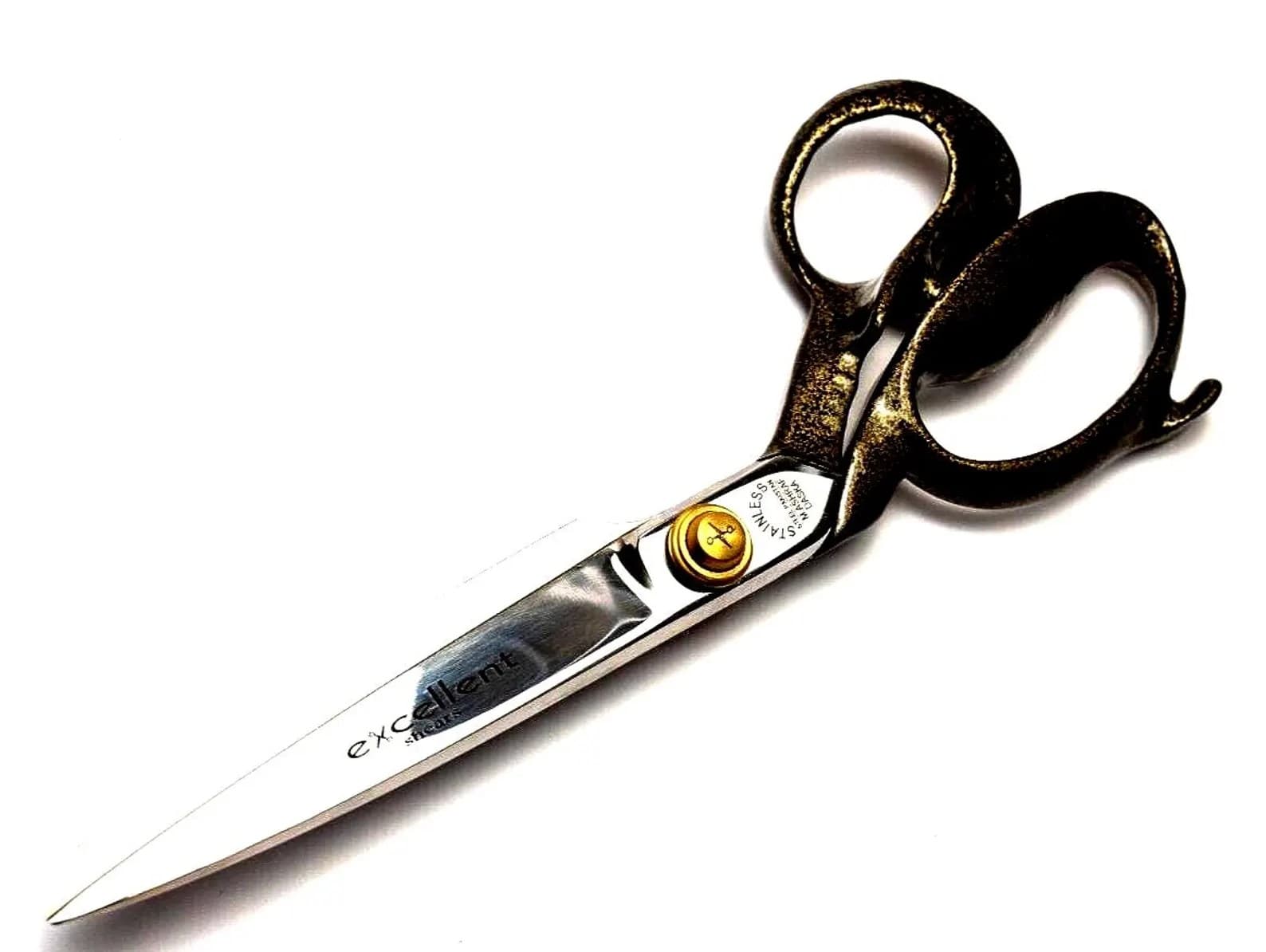 Close-up of high-carbon stainless steel blades showing sharp cutting edge of upholstery shear tailor scissors.